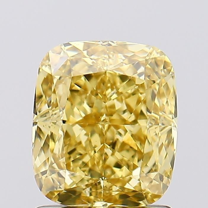 Loose Diamond - CUSHION MODIFIED 1.6ct Fancy Vivid Yellow VVS2: Loose Diamond - CUSHION MODIFIED 1.6ct Fancy Vivid Yellow VVS2 Source: This is a real non-mined Diamond that has been grown in a lab Shape: CUSHION MODIFIED Carats: 1.6 Color: Fancy Vivid Yellow Certi