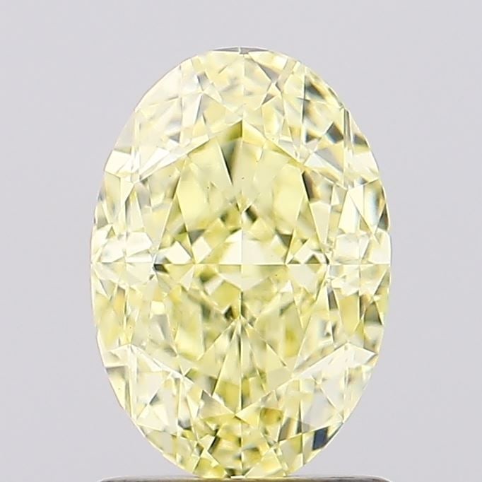 Loose Diamond - OVAL 1.6ct Fancy Yellow VS1: Loose Diamond - OVAL 1.6ct Fancy Yellow VS1 Source: This is a real non-mined Diamond that has been grown in a lab Shape: OVAL Carats: 1.6 Color: Fancy Yellow Certification: IGI Video: