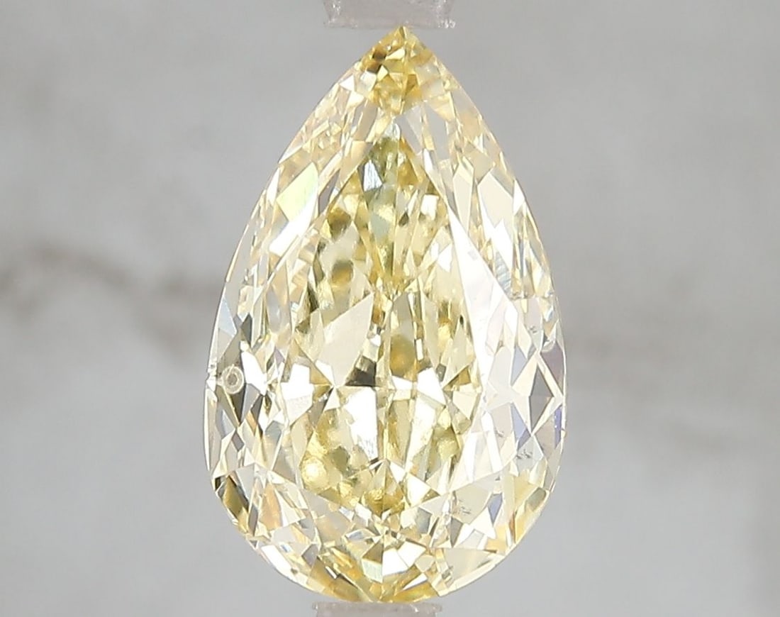 Loose Diamond - PEAR 3.03ct Fancy Intense Yellow VS1: Loose Diamond - PEAR 3.03ct Fancy Intense Yellow VS1 Source: This is a real non-mined Diamond that has been grown in a lab Shape: PEAR Carats: 3.03 Color: Fancy Intense Yellow Certification: IGI Video
