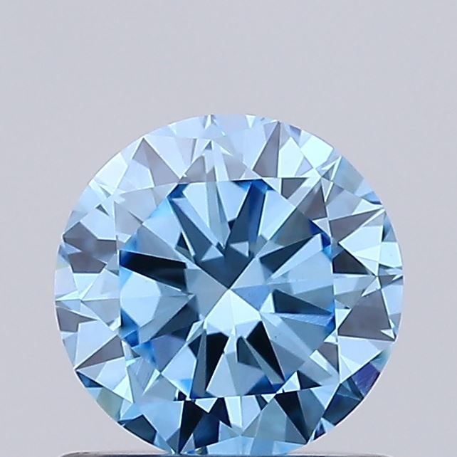 Loose Diamond - ROUND 0.72ct Fancy Vivid Blue VVS2: Loose Diamond - ROUND 0.72ct Fancy Vivid Blue VVS2 Source: This is a real non-mined Diamond that has been grown in a lab Shape: ROUND Carats: 0.72 Color: Fancy Vivid Blue Certification: IGI Video: