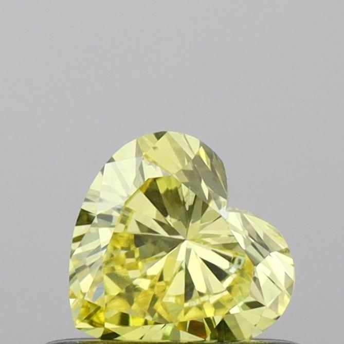 Loose Diamond - HEART 0.34ct Fancy Vivid Yellow VS2: Loose Diamond - HEART 0.34ct Fancy Vivid Yellow VS2 Source: This is a real non-mined Diamond that has been grown in a lab Shape: HEART Carats: 0.34 Color: Fancy Vivid Yellow Certification: IGI Video: