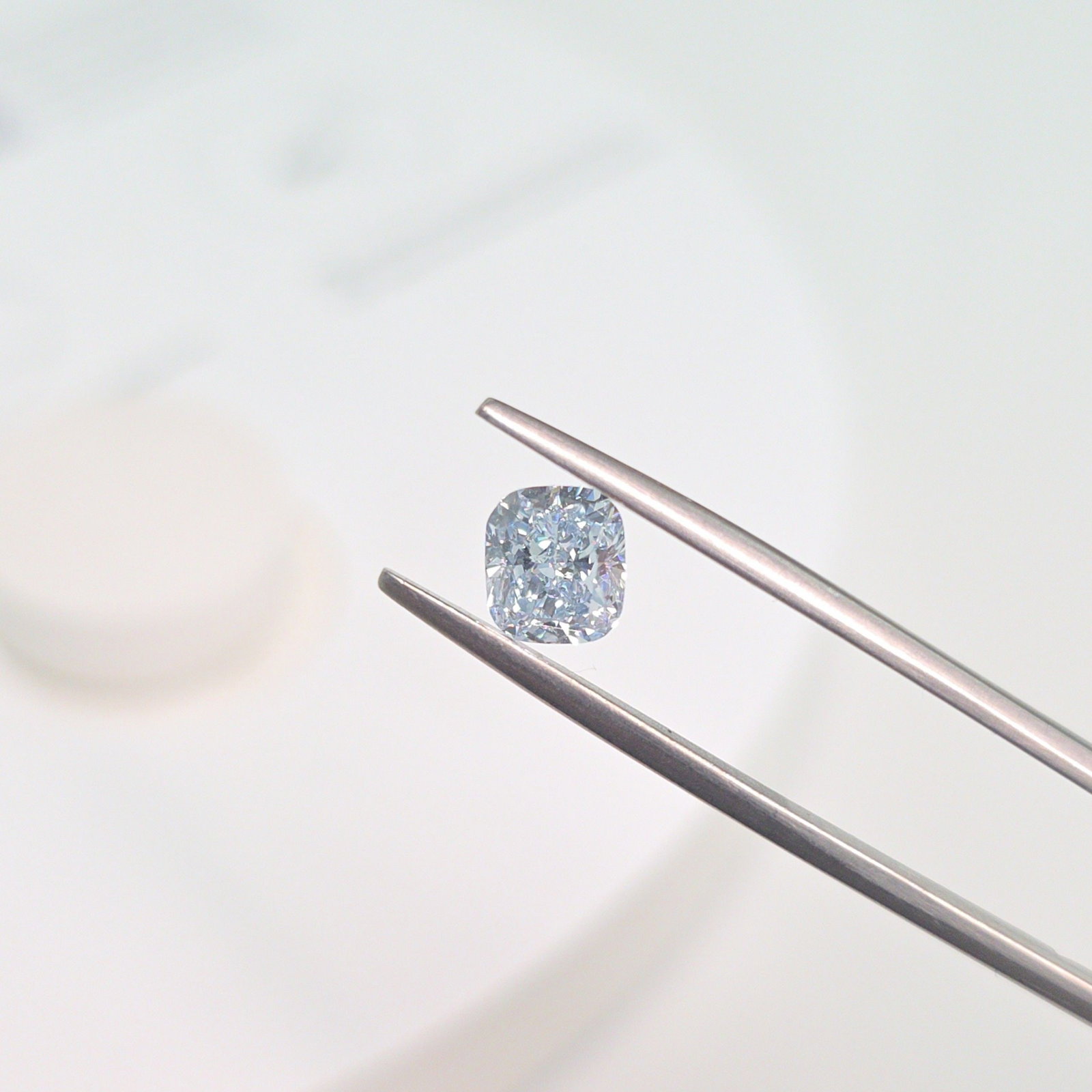 Loose Diamond - CUSHION MODIFIED 1.05ct Fancy Light Blue VS2: Loose Diamond - CUSHION MODIFIED 1.05ct Fancy Light Blue VS2 Source: This is a real non-mined Diamond that has been grown in a lab Shape: CUSHION MODIFIED Carats: 1.05 Color: Fancy Light Blue Certific