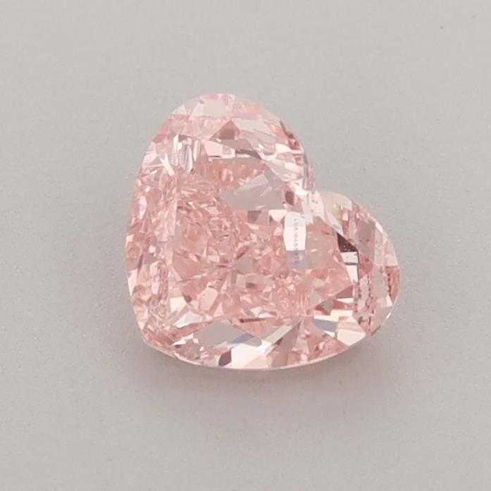 Loose Diamond - HEART 0.77ct Fancy Vivid Pink VS1: Loose Diamond - HEART 0.77ct Fancy Vivid Pink VS1 Source: This is a real non-mined Diamond that has been grown in a lab Shape: HEART Carats: 0.77 Color: Fancy Vivid Pink Certification: IGI Video: