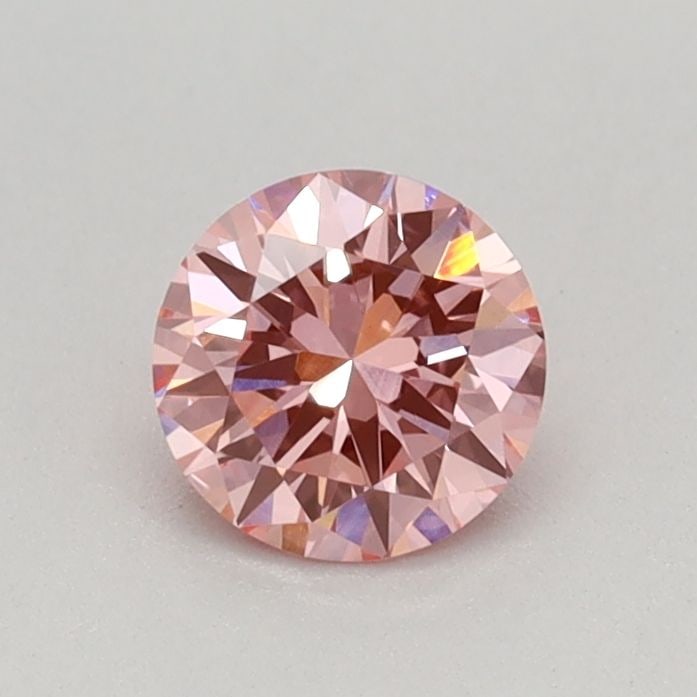 Loose Diamond - ROUND 0.38ct Fancy Vivid Pink VVS2: Loose Diamond - ROUND 0.38ct Fancy Vivid Pink VVS2 Source: This is a real non-mined Diamond that has been grown in a lab Shape: ROUND Carats: 0.38 Color: Fancy Vivid Pink Certification: IGI Video: