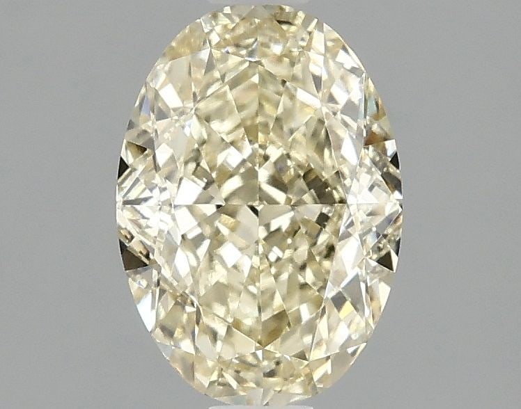 Loose Diamond - OVAL 1.59ct Fancy Intense Yellow VS1: Loose Diamond - OVAL 1.59ct Fancy Intense Yellow VS1 Source: This is a real non-mined Diamond that has been grown in a lab Shape: OVAL Carats: 1.59 Color: Fancy Intense Yellow Certification: IGI Video