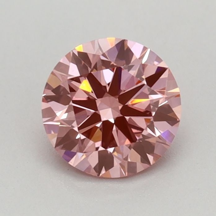 Loose Diamond - ROUND 0.59ct Fancy Vivid Pink VS1: Loose Diamond - ROUND 0.59ct Fancy Vivid Pink VS1 Source: This is a real non-mined Diamond that has been grown in a lab Shape: ROUND Carats: 0.59 Color: Fancy Vivid Pink Certification: IGI Video: