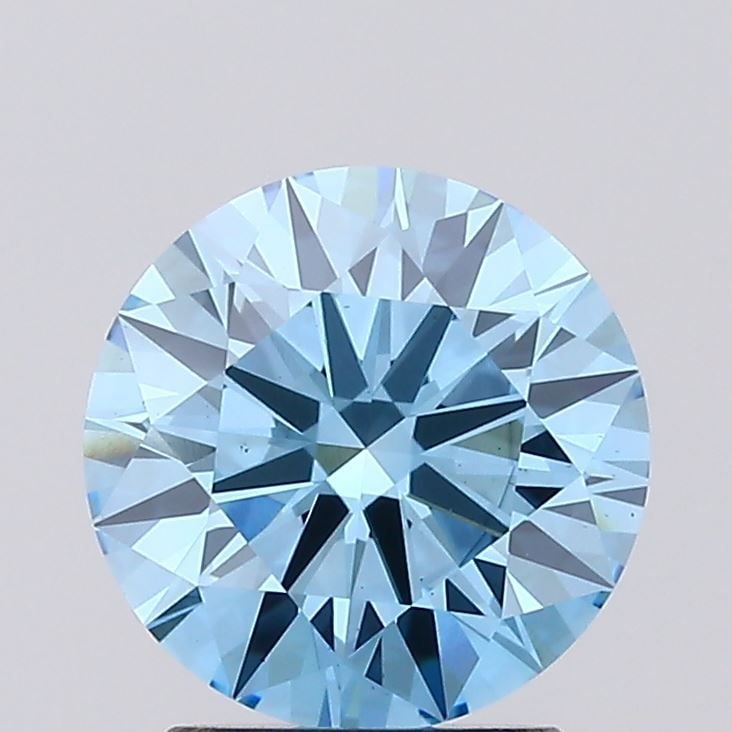 Ideal Loose Diamond - ROUND 2.05ct Fancy Vivid Blue VS1: Ideal Loose Diamond - ROUND 2.05ct Fancy Vivid Blue VS1 Source: This is a real non-mined Diamond that has been grown in a lab Shape: ROUND Carats: 2.05 Color: Fancy Vivid Blue Certification: IGI Video