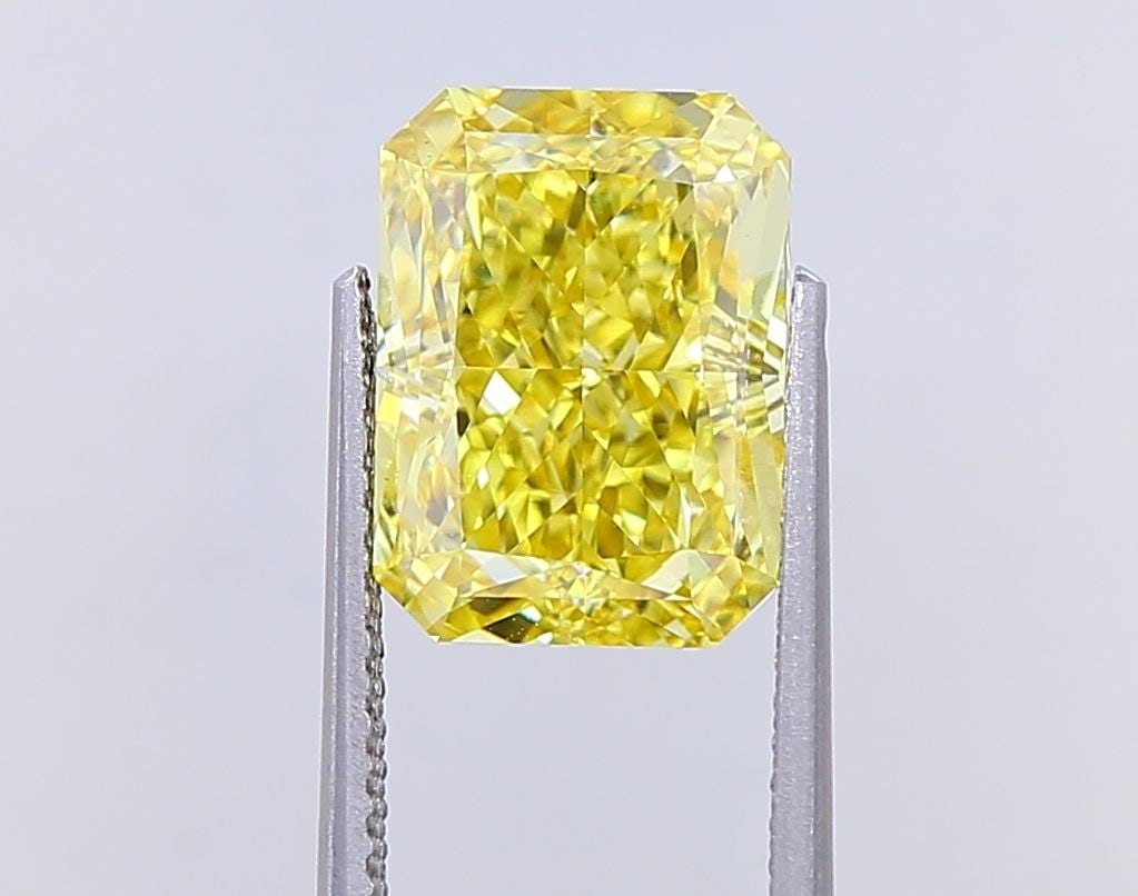 Loose Diamond - RADIANT 5.02ct Fancy Vivid Yellow VS2: Loose Diamond - RADIANT 5.02ct Fancy Vivid Yellow VS2 Source: This is a real non-mined Diamond that has been grown in a lab Shape: RADIANT Carats: 5.02 Color: Fancy Vivid Yellow Certification: IGI Vid