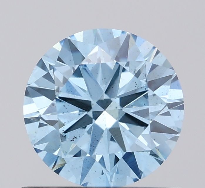 Loose Diamond - ROUND 0.72ct Fancy Vivid Blue VS2: Loose Diamond - ROUND 0.72ct Fancy Vivid Blue VS2 Source: This is a real non-mined Diamond that has been grown in a lab Shape: ROUND Carats: 0.72 Color: Fancy Vivid Blue Certification: IGI Video: