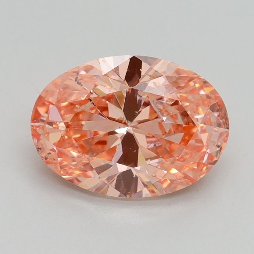 Loose Diamond - OVAL 1.7ct Fancy Vivid Pink SI2: Loose Diamond - OVAL 1.7ct Fancy Vivid Pink SI2 Source: This is a real non-mined Diamond that has been grown in a lab Shape: OVAL Carats: 1.7 Color: Fancy Vivid Pink Certification: IGI Video: