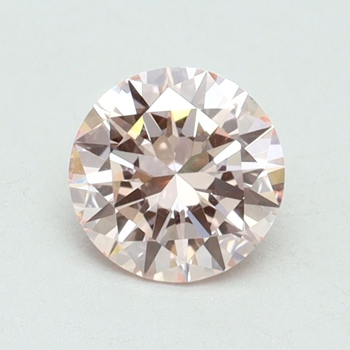 Loose Diamond - ROUND 0.7ct Fancy Intense Pink VS1: Loose Diamond - ROUND 0.7ct Fancy Intense Pink VS1 Source: This is a real non-mined Diamond that has been grown in a lab Shape: ROUND Carats: 0.7 Color: Fancy Intense Pink Certification: IGI Video: