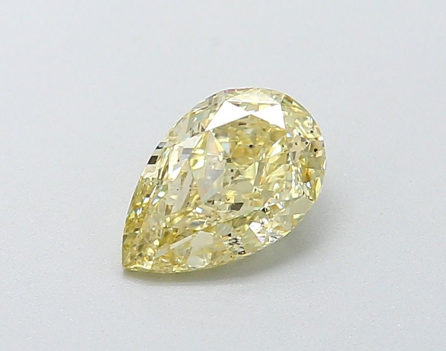 Loose Diamond - PEAR 1.13ct Fancy Yellow VS2: Loose Diamond - PEAR 1.13ct Fancy Yellow VS2 Source: This is a real non-mined Diamond that has been grown in a lab Shape: PEAR Carats: 1.13 Color: Fancy Yellow Certification: IGI Video: