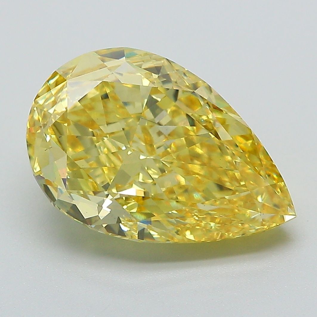 Loose Diamond - PEAR 5.03ct Fancy Vivid Yellow VS2: Loose Diamond - PEAR 5.03ct Fancy Vivid Yellow VS2 Source: This is a real non-mined Diamond that has been grown in a lab Shape: PEAR Carats: 5.03 Color: Fancy Vivid Yellow Certification: IGI Video: