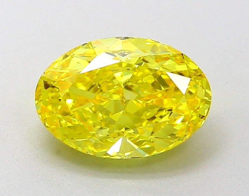 Loose Diamond - OVAL 2.04ct Fancy Vivid Yellow VVS1: Loose Diamond - OVAL 2.04ct Fancy Vivid Yellow VVS1 Source: This is a real non-mined Diamond that has been grown in a lab Shape: OVAL Carats: 2.04 Color: Fancy Vivid Yellow Certification: IGI Video:
