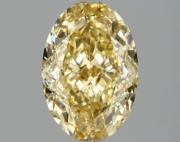 Loose Diamond - OVAL 1.59ct Fancy Vivid Yellow VS1: Loose Diamond - OVAL 1.59ct Fancy Vivid Yellow VS1 Source: This is a real non-mined Diamond that has been grown in a lab Shape: OVAL Carats: 1.59 Color: Fancy Vivid Yellow Certification: IGI Video: