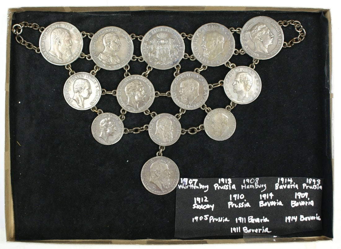 Chain Linked German Breastplate Jewelry with 13 Silver Mark Coins and Box: Chain Linked German Breastplate Jewelry with 13 Silver Mark Coins and Box This German breastplate jewelry piece features 13 authentic silver coins, chain linked together. The set includes coins from v