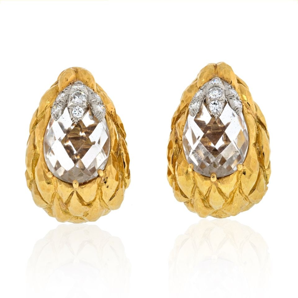 David Webb Vintage Platinum 18K Gold Rock Crystal Clip-On Earrings: David Webb Vintage Platinum 18K Gold Rock Crystal Clip-On Earrings These exquisite vintage clip-on earrings by David Webb showcase a stunning blend of platinum and 18K yellow gold. The earrings featur