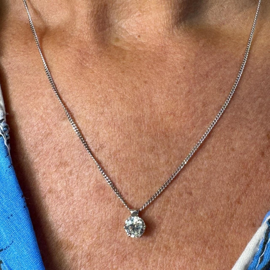 Diamond Necklace in 18K White Gold with 1.30 Carat European Cut Stone: Diamond Necklace in 18K White Gold with 1.30 Carat European Cut Stone This elegant necklace is crafted from 18K white gold and features an approximately 1.30 carat European-cut diamond. The diamond is