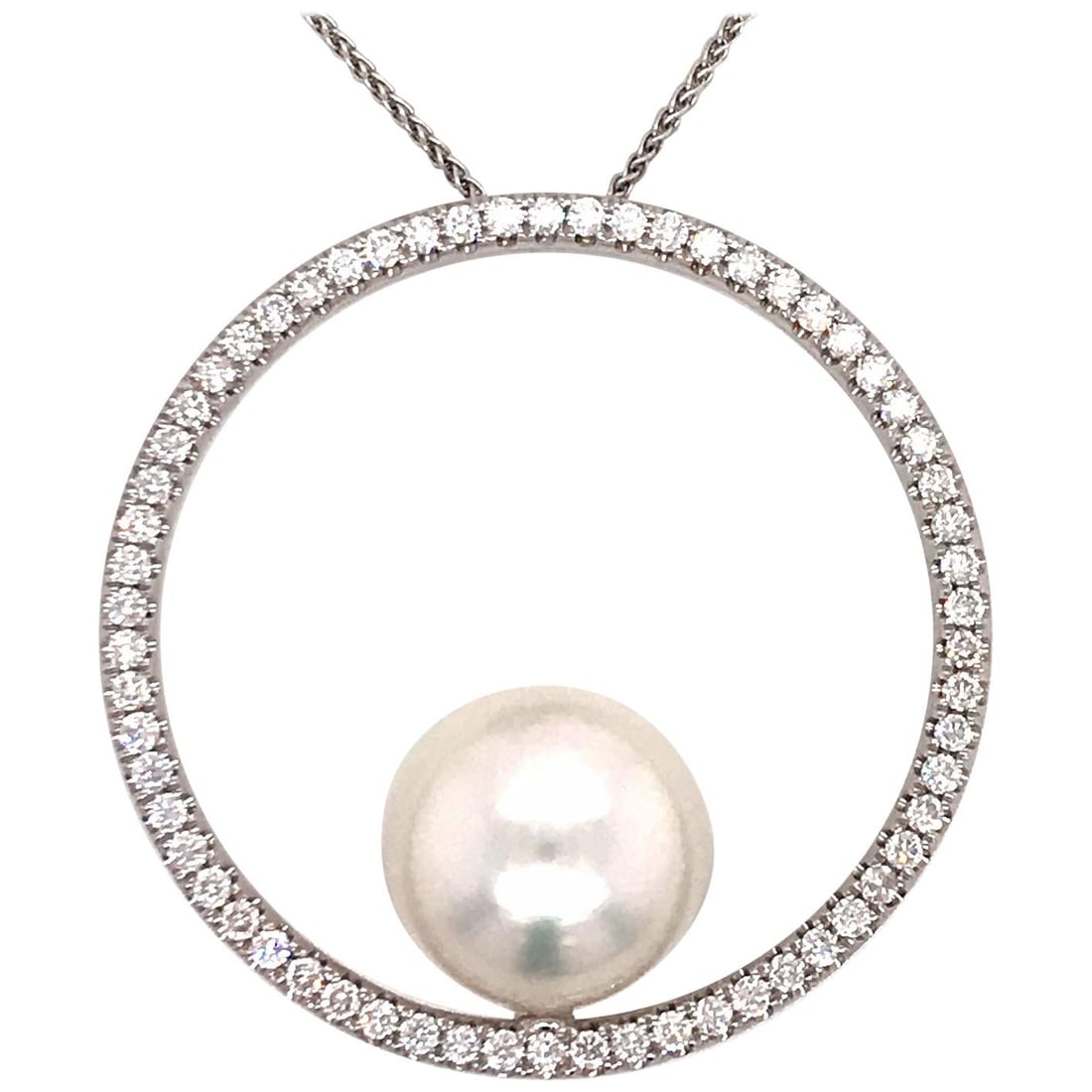 Harbor Diamonds 18K White Gold South Sea Pearl Diamond Pendant 1.04 Carat: Harbor Diamonds 18K White Gold South Sea Pearl Diamond Pendant 1.04 Carat This exquisite pendant is crafted in 18K white gold and features a stunning South Sea Pearl measuring 13-14 mm, encircled by a
