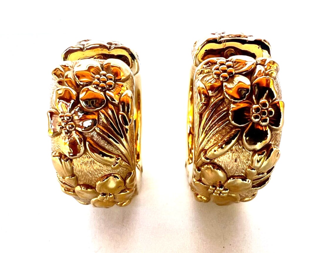 French 18K Yellow Gold Large Flower Hoop Earrings: French 18K Yellow Gold Large Flower Hoop Earrings This exquisite pair of large flower earrings showcases a stunning design in 18K yellow gold. Weighing 29.20 grams, each earring features a hoop style