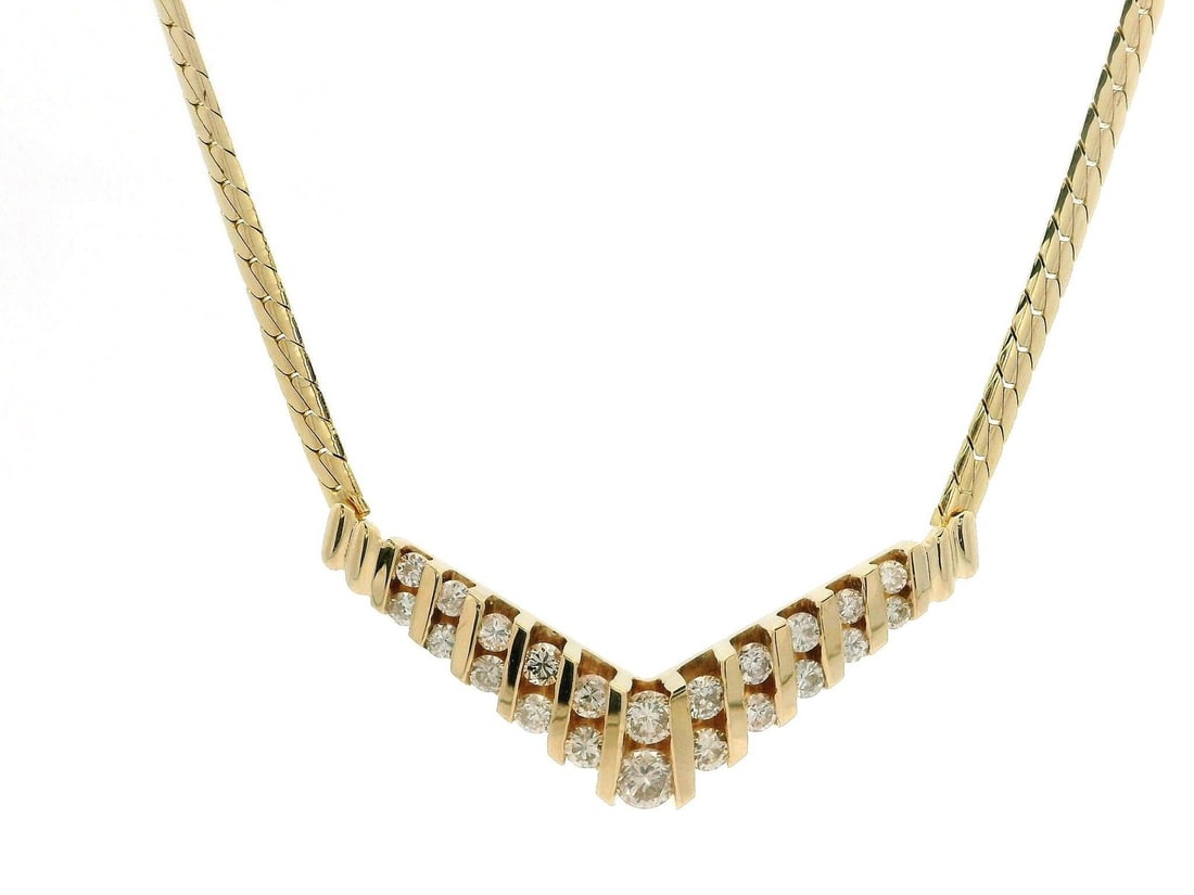 Italian 14k Gold 0.80ct Diamond V Chevron Necklace 17in: Italian 14k Gold 0.80ct Diamond V Chevron Necklace 17in This elegant necklace features a stunning design crafted from solid 14k yellow gold. The centerpiece showcases a V-shaped chevron adorned with 2