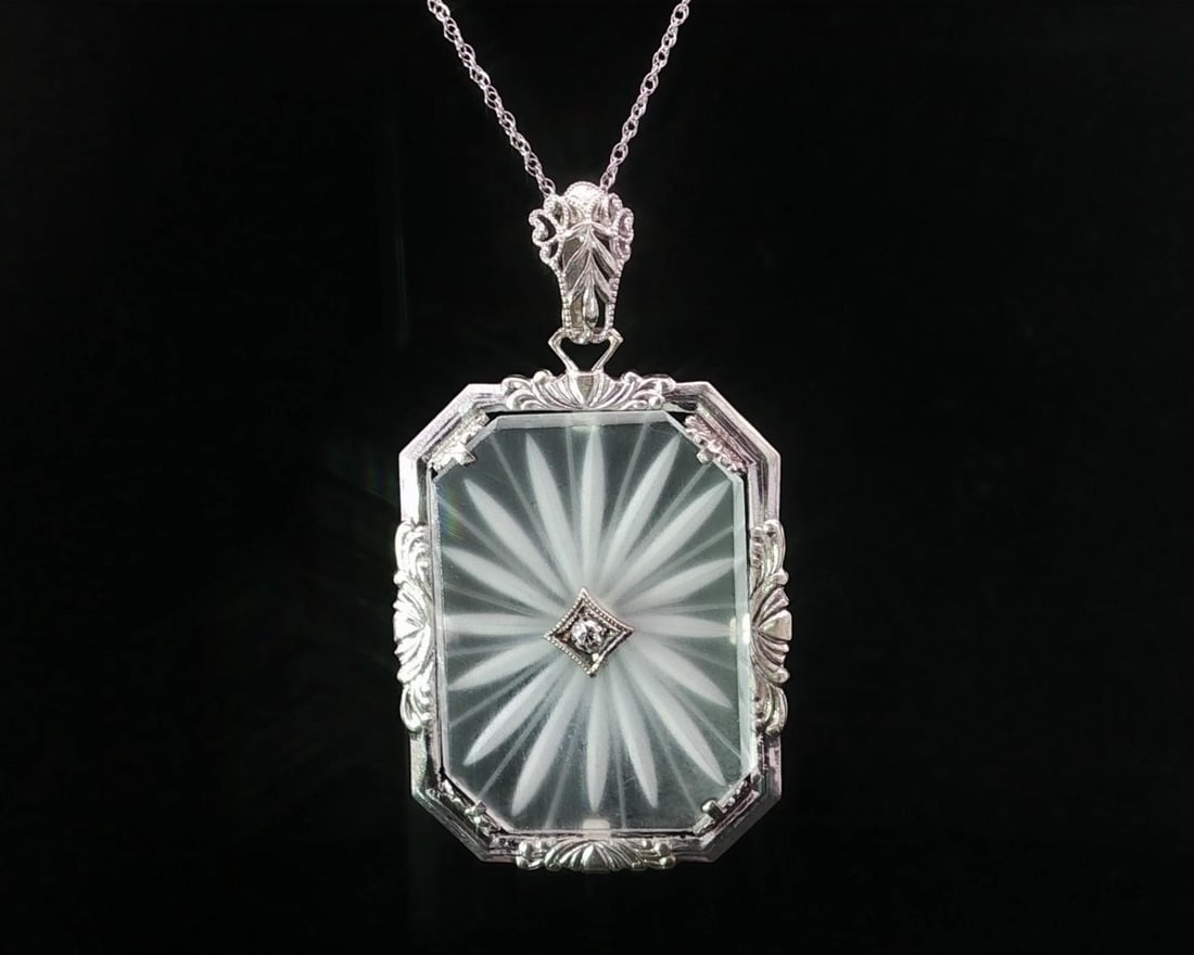 Antique Art Deco 14k White Gold Diamond Filigree Pendant Necklace: Antique Art Deco 14k White Gold Diamond Filigree Pendant Necklace This exquisite Antique Art Deco necklace features a stunning pendant crafted from solid 14k white gold, showcasing a beautiful camphor