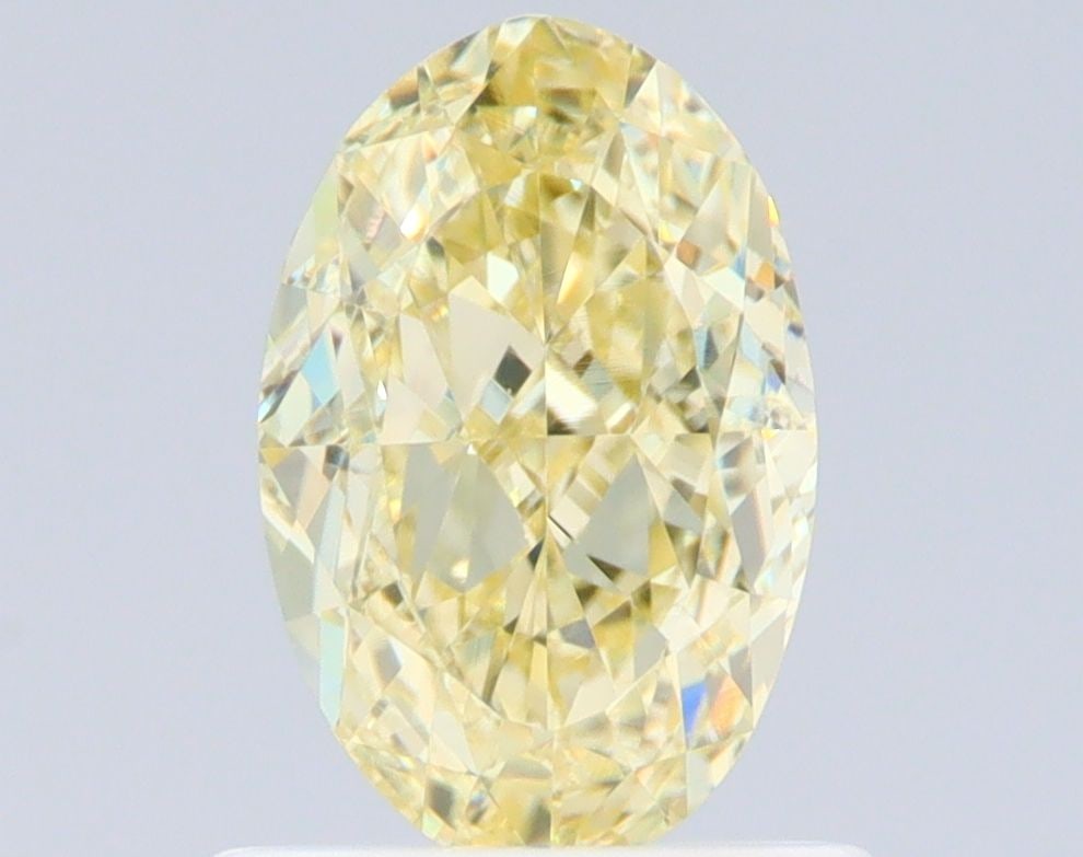 Loose Diamond - OVAL 1.01ct Fancy Light Yellow SI1: Loose Diamond - OVAL 1.01ct Fancy Light Yellow SI1 Source: Natural Shape: OVAL Carats: 1.01 Color: Fancy Light Yellow Certification: GIA Video: