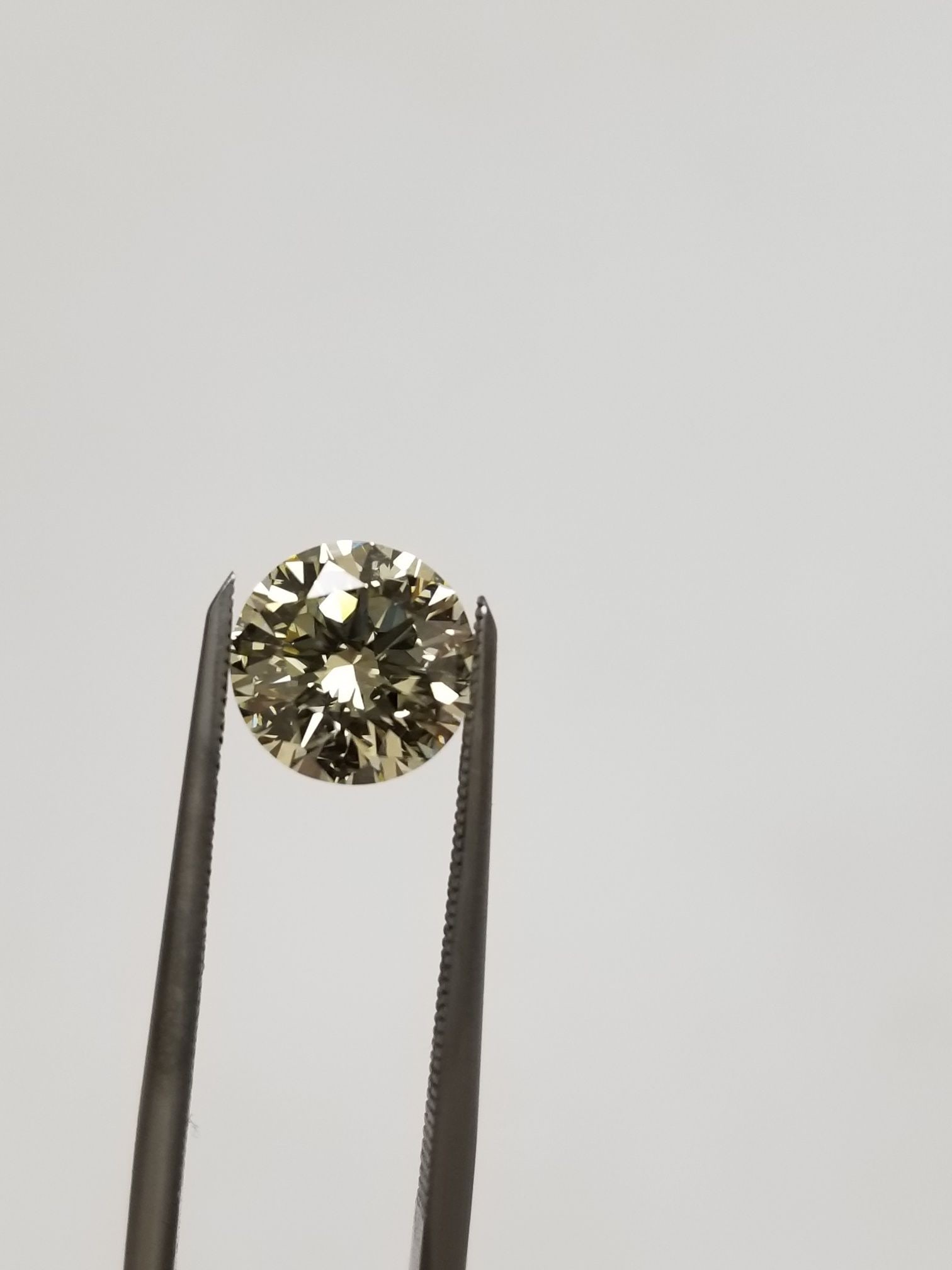 Loose Diamond - ROUND 1.74ct O-P VS2: Loose Diamond - ROUND 1.74ct O-P VS2 Source: Natural Shape: ROUND Carats: 1.74 Color: O-P Certification: GIA PLEASE NOTE: Framed, Large, or heavy items do not have shipping costs included. The exact s