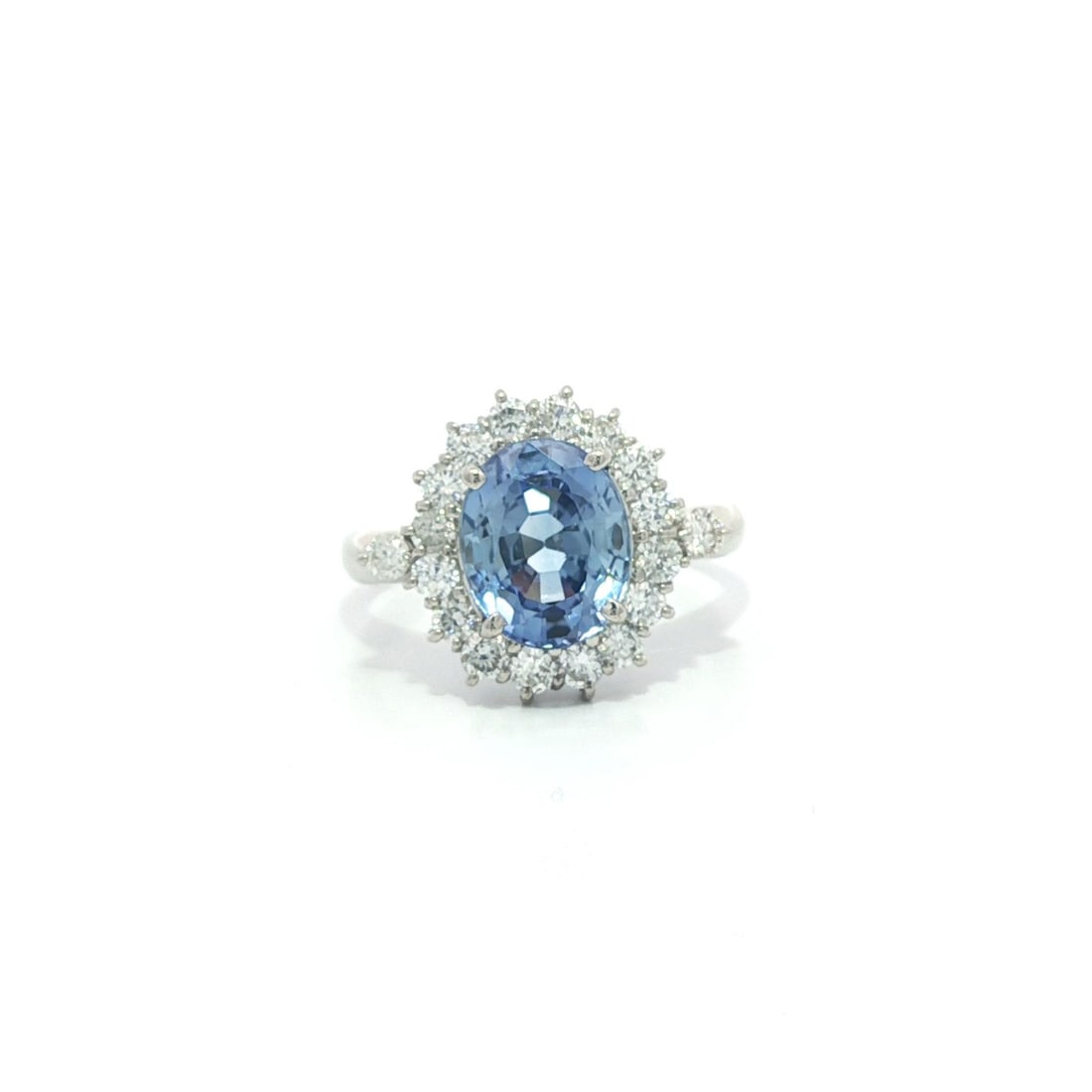 Vintage GIA Certified 3.36ct No Heat Ceylon Blue Sapphire Diamond Ring in Platinum: Vintage GIA Certified 3.36ct No Heat Ceylon Blue Sapphire Diamond Ring in Platinum This exquisite vintage cocktail ring showcases a stunning 2.76ct natural Ceylon sapphire, renowned for its vibrant co