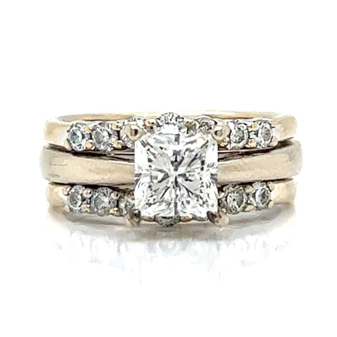 14K White Gold 1.58 Ct GIA Certified Diamond Ring with Guard: 14K White Gold 1.58 Ct GIA Certified Diamond Ring with Guard This stunning 14K white gold diamond ring features a magnificent 1.58 Ct. GIA certified princess-cut diamond, showcasing an I color and SI1