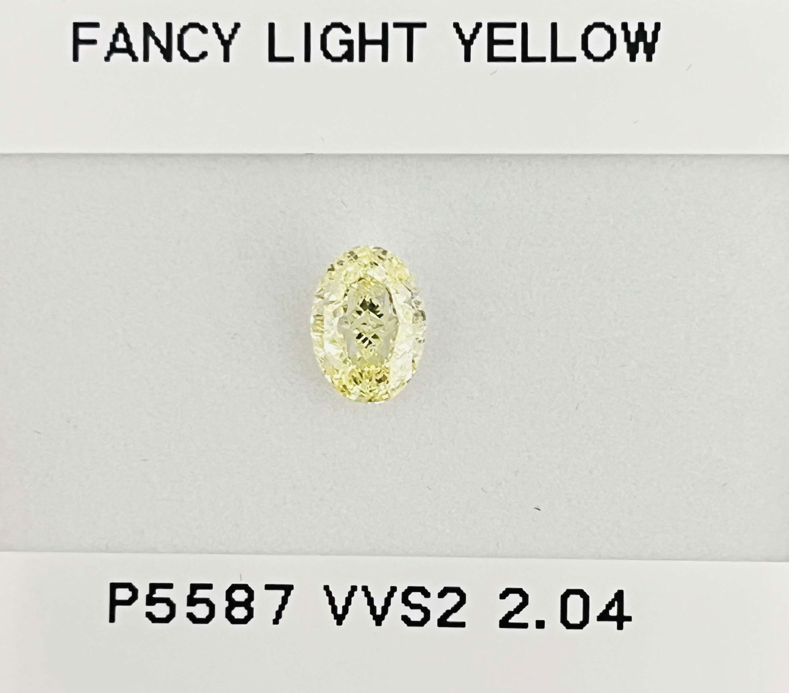 Loose Diamond - OVAL 2.04ct Fancy Light Yellow VVS2: Loose Diamond - OVAL 2.04ct Fancy Light Yellow VVS2 Source: Natural Shape: OVAL Carats: 2.04 Color: Fancy Light Yellow Certification: GIA Video: