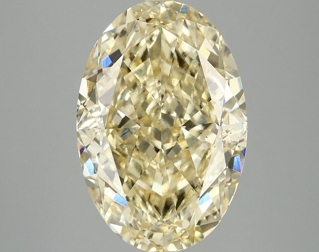 Loose Diamond - OVAL 5.07ct Fancy Intense Yellow VS2: Loose Diamond - OVAL 5.07ct Fancy Intense Yellow VS2 Source: This is a real non-mined Diamond that has been grown in a lab Shape: OVAL Carats: 5.07 Color: Fancy Intense Yellow Certification: IGI Video
