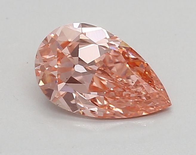 Loose Diamond - PEAR 0.67ct Fancy Vivid Pink VS1: Loose Diamond - PEAR 0.67ct Fancy Vivid Pink VS1 Source: This is a real non-mined Diamond that has been grown in a lab Shape: PEAR Carats: 0.67 Color: Fancy Vivid Pink Certification: IGI Video: