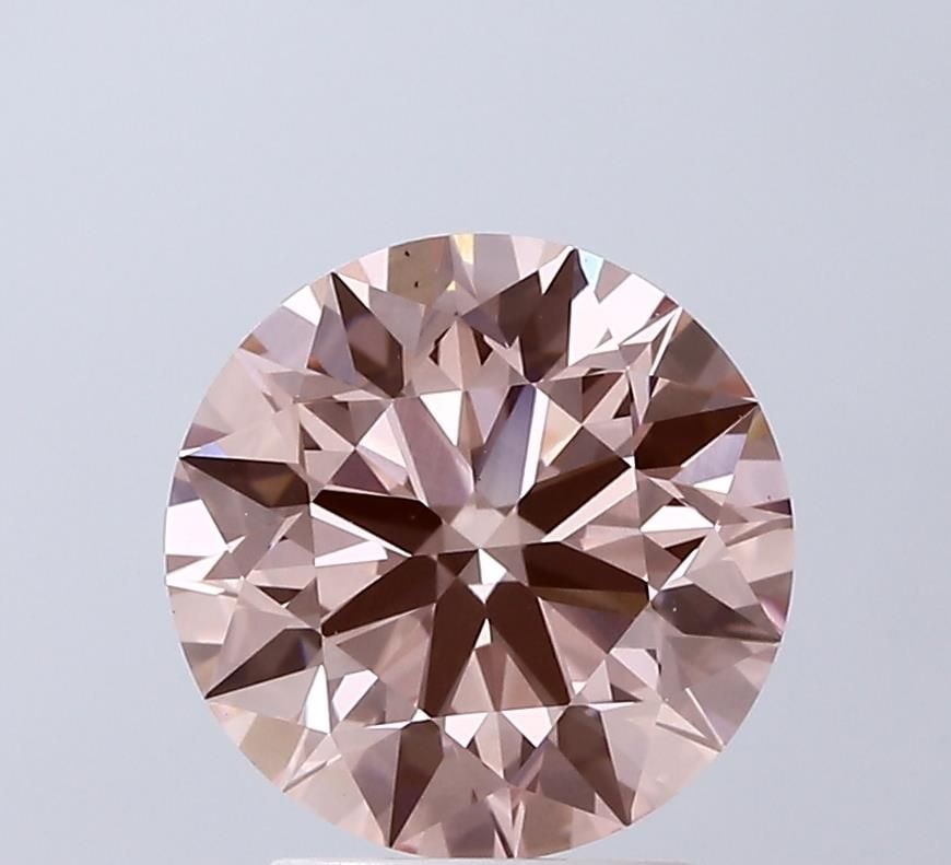 Ideal Loose Diamond - ROUND 2.5ct Fancy Vivid Pink VS1: Ideal Loose Diamond - ROUND 2.5ct Fancy Vivid Pink VS1 Source: This is a real non-mined Diamond that has been grown in a lab Shape: ROUND Carats: 2.5 Color: Fancy Vivid Pink Certification: IGI Video:
