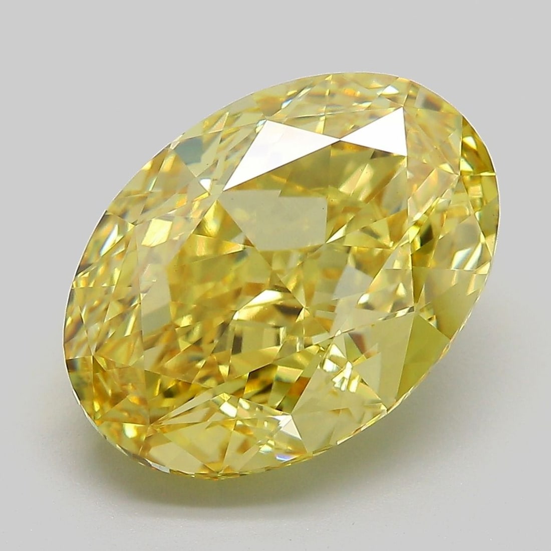 Loose Diamond - OVAL 8.03ct Fancy Vivid Yellow VVS2: Loose Diamond - OVAL 8.03ct Fancy Vivid Yellow VVS2 Source: This is a real non-mined Diamond that has been grown in a lab Shape: OVAL Carats: 8.03 Color: Fancy Vivid Yellow Certification: IGI Video: