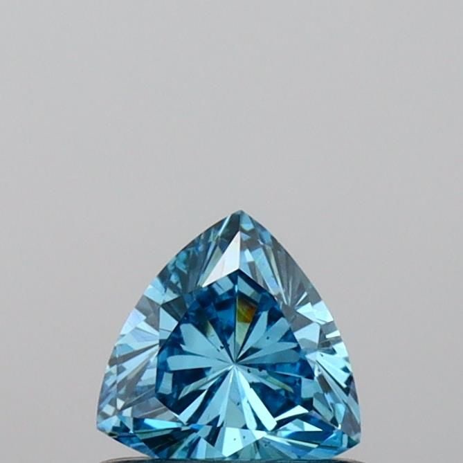 Loose Diamond - TRIANGULAR 0.43ct Fancy Vivid Blue SI1: Loose Diamond - TRIANGULAR 0.43ct Fancy Vivid Blue SI1 Source: This is a real non-mined Diamond that has been grown in a lab Shape: TRIANGULAR Carats: 0.43 Color: Fancy Vivid Blue Certification: IGI V