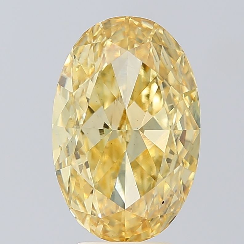Loose Diamond - OVAL 5.03ct Fancy Vivid Yellow VS1: Loose Diamond - OVAL 5.03ct Fancy Vivid Yellow VS1 Source: This is a real non-mined Diamond that has been grown in a lab Shape: OVAL Carats: 5.03 Color: Fancy Vivid Yellow Certification: IGI Video: