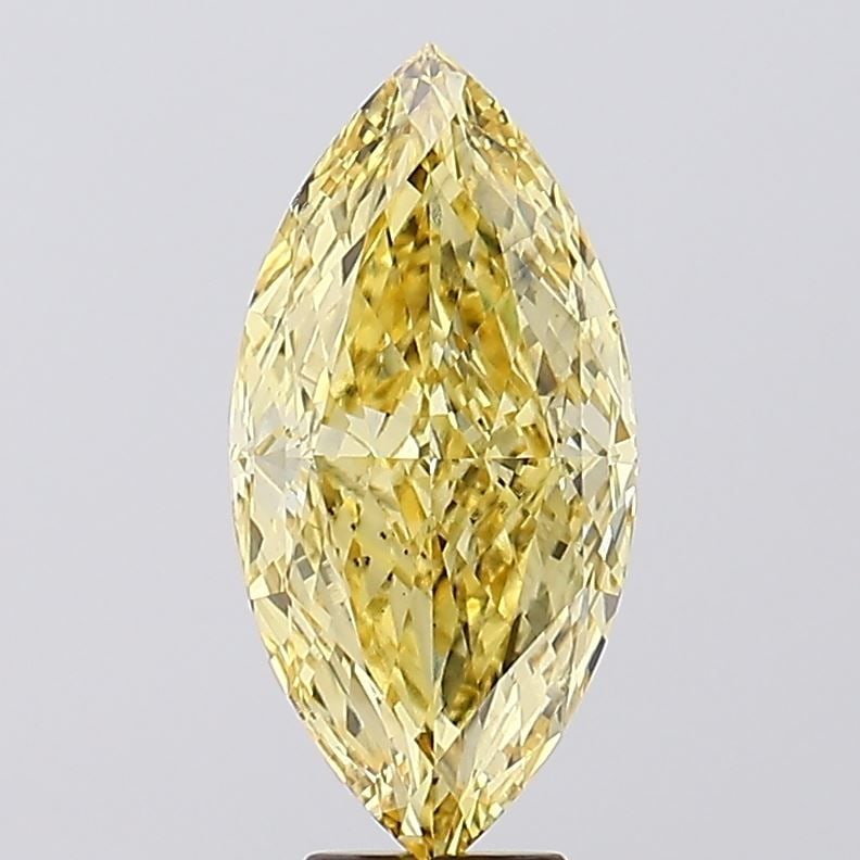 Loose Diamond - MARQUISE 6.55ct Fancy Vivid Yellow VS2: Loose Diamond - MARQUISE 6.55ct Fancy Vivid Yellow VS2 Source: This is a real non-mined Diamond that has been grown in a lab Shape: MARQUISE Carats: 6.55 Color: Fancy Vivid Yellow Certification: IGI V
