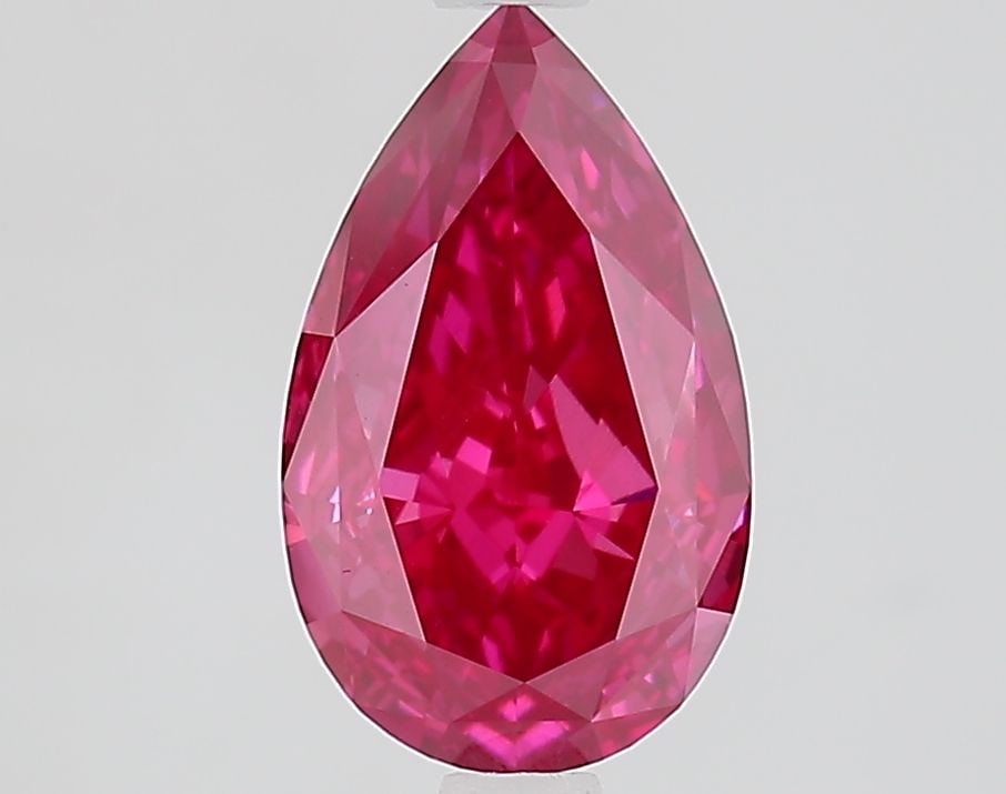 Loose Diamond - PEAR 1.79ct Fancy Vivid Pink VVS2: Loose Diamond - PEAR 1.79ct Fancy Vivid Pink VVS2 Source: This is a real non-mined Diamond that has been grown in a lab Shape: PEAR Carats: 1.79 Color: Fancy Vivid Pink Certification: IGI Video:
