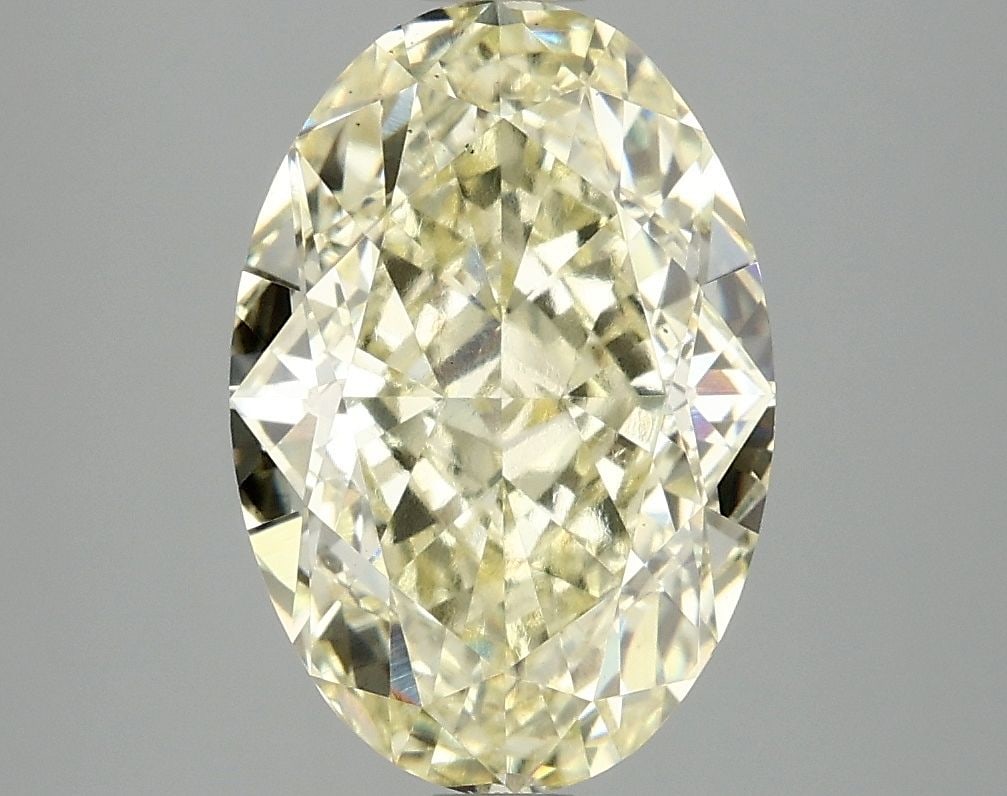 Loose Diamond - OVAL 4.1ct Fancy Yellow VS2: Loose Diamond - OVAL 4.1ct Fancy Yellow VS2 Source: This is a real non-mined Diamond that has been grown in a lab Shape: OVAL Carats: 4.1 Color: Fancy Yellow Certification: IGI Video: