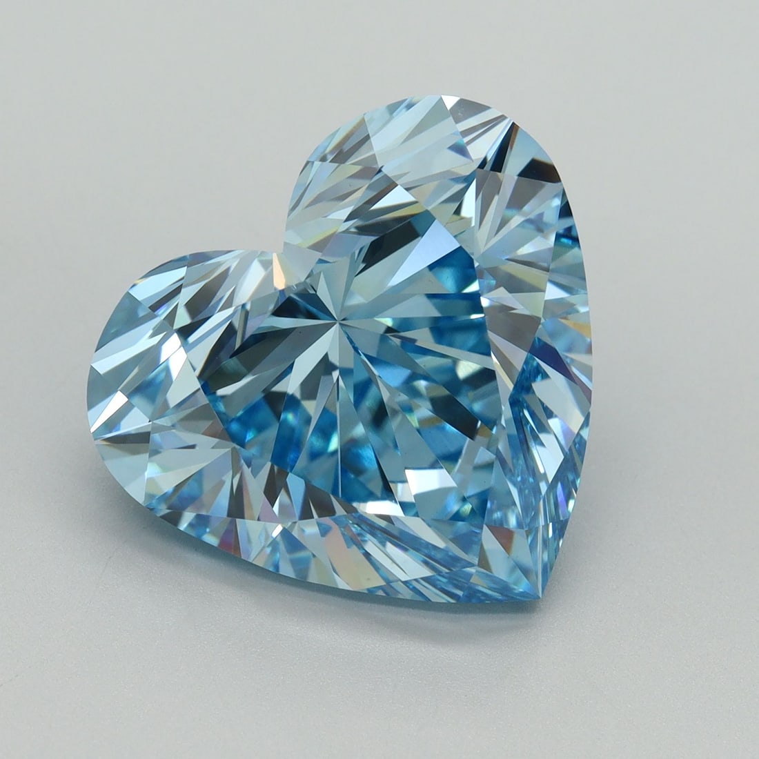 Loose Diamond - HEART 12.51ct Fancy Vivid Blue VS1: Loose Diamond - HEART 12.51ct Fancy Vivid Blue VS1 Source: This is a real non-mined Diamond that has been grown in a lab Shape: HEART Carats: 12.51 Color: Fancy Vivid Blue Certification: IGI Video: