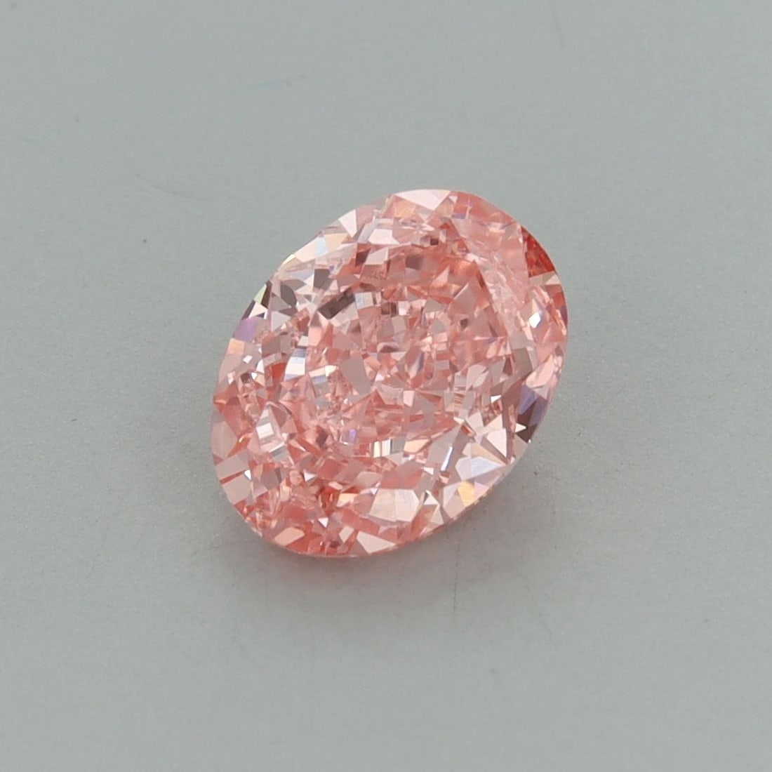 Loose Diamond - OVAL 1.55ct Fancy Vivid Pink VS1: Loose Diamond - OVAL 1.55ct Fancy Vivid Pink VS1 Source: This is a real non-mined Diamond that has been grown in a lab Shape: OVAL Carats: 1.55 Color: Fancy Vivid Pink Certification: IGI Video: