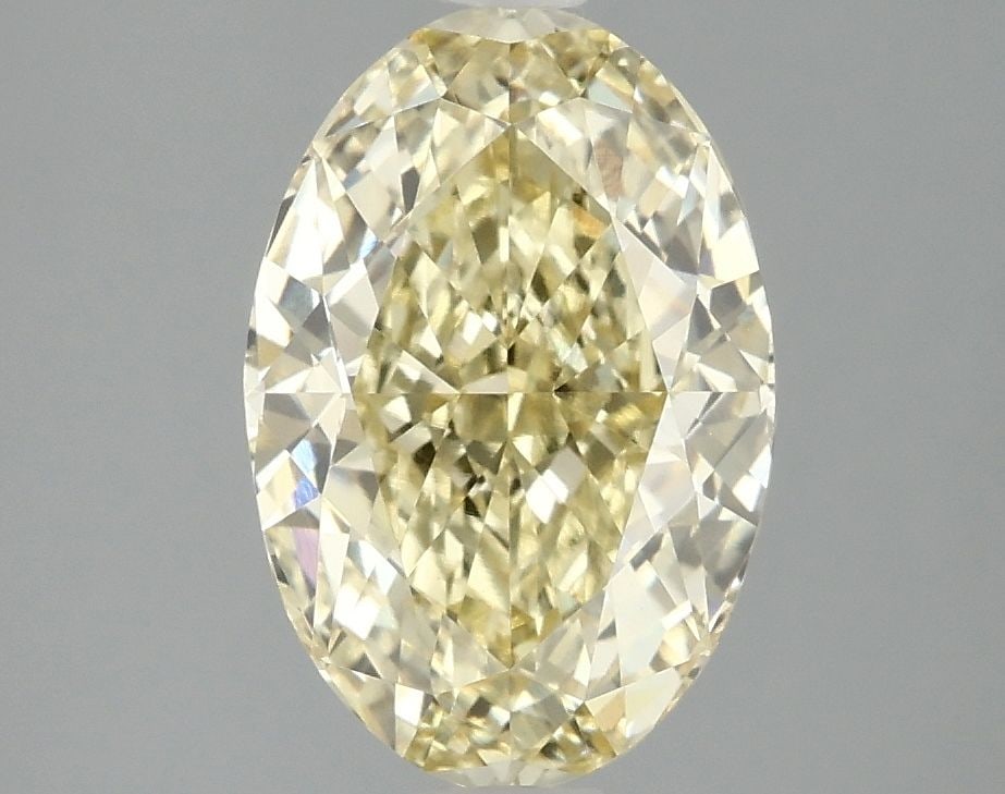 Loose Diamond - OVAL 3.01ct Fancy Vivid Yellow VVS2: Loose Diamond - OVAL 3.01ct Fancy Vivid Yellow VVS2 Source: This is a real non-mined Diamond that has been grown in a lab Shape: OVAL Carats: 3.01 Color: Fancy Vivid Yellow Certification: IGI Video: