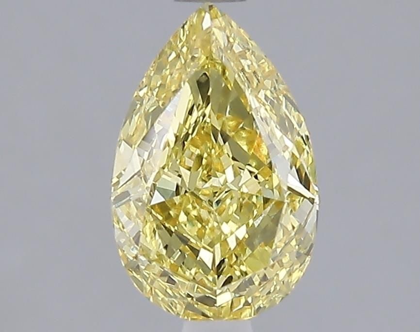 Loose Diamond - PEAR 1.51ct Fancy Vivid Yellow VS1: Loose Diamond - PEAR 1.51ct Fancy Vivid Yellow VS1 Source: This is a real non-mined Diamond that has been grown in a lab Shape: PEAR Carats: 1.51 Color: Fancy Vivid Yellow Certification: IGI Video: