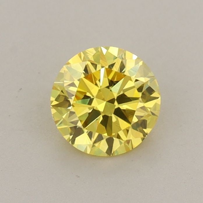 Loose Diamond - ROUND 0.55ct Fancy Vivid Yellow VVS2: Loose Diamond - ROUND 0.55ct Fancy Vivid Yellow VVS2 Source: This is a real non-mined Diamond that has been grown in a lab Shape: ROUND Carats: 0.55 Color: Fancy Vivid Yellow Certification: IGI Video: