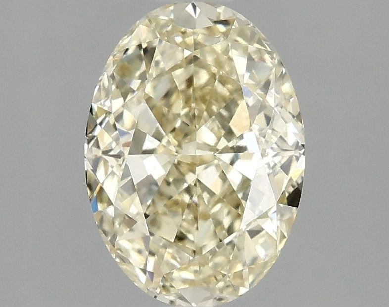 Loose Diamond - OVAL 2.06ct Fancy Yellow VS1: Loose Diamond - OVAL 2.06ct Fancy Yellow VS1 Source: This is a real non-mined Diamond that has been grown in a lab Shape: OVAL Carats: 2.06 Color: Fancy Yellow Certification: IGI Video:
