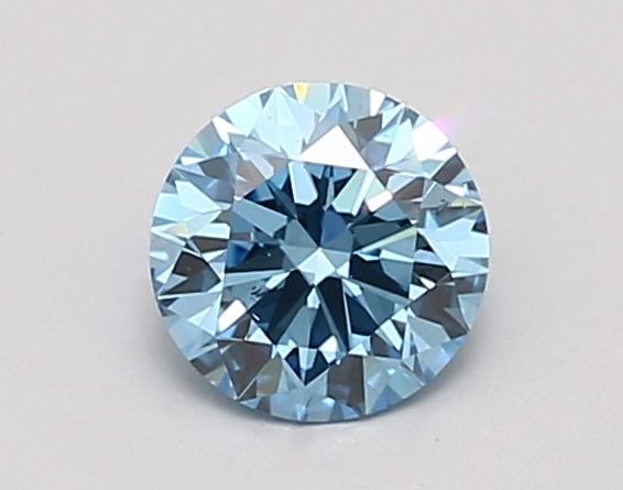Ideal Loose Diamond - ROUND 0.91ct Fancy Vivid Blue SI1: Ideal Loose Diamond - ROUND 0.91ct Fancy Vivid Blue SI1 Source: This is a real non-mined Diamond that has been grown in a lab Shape: ROUND Carats: 0.91 Color: Fancy Vivid Blue Certification: IGI Video