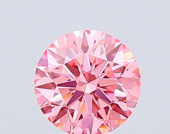Ideal Loose Diamond - ROUND 1.06ct Fancy Vivid Pink VVS2: Ideal Loose Diamond - ROUND 1.06ct Fancy Vivid Pink VVS2 Source: This is a real non-mined Diamond that has been grown in a lab Shape: ROUND Carats: 1.06 Color: Fancy Vivid Pink Certification: IGI Vide