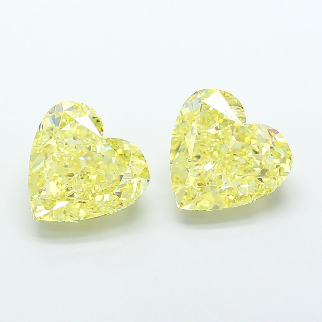 Loose Diamond - HEART 6.6ct Fancy Intense Yellow VS1: Loose Diamond - HEART 6.6ct Fancy Intense Yellow VS1 Source: This is a real non-mined Diamond that has been grown in a lab Shape: HEART Carats: 6.6 Color: Fancy Intense Yellow Certification: IGI Video