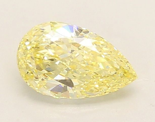 Loose Diamond - PEAR 0.7ct Fancy Intense Yellow VS1: Loose Diamond - PEAR 0.7ct Fancy Intense Yellow VS1 Source: This is a real non-mined Diamond that has been grown in a lab Shape: PEAR Carats: 0.7 Color: Fancy Intense Yellow Certification: IGI Video: